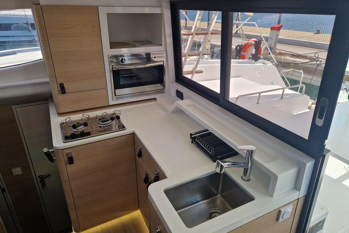 Galley of Wenny, a Aventura Catamarans Aventura 37 catamaran at Sant Antoni de Portmany, Spain