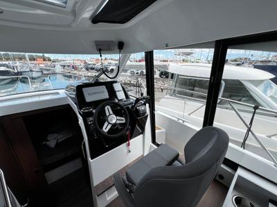 Cockpit of Ana, a Beneteau Antares 9 OB motorboat at Grad Biograd na Moru, Croatia