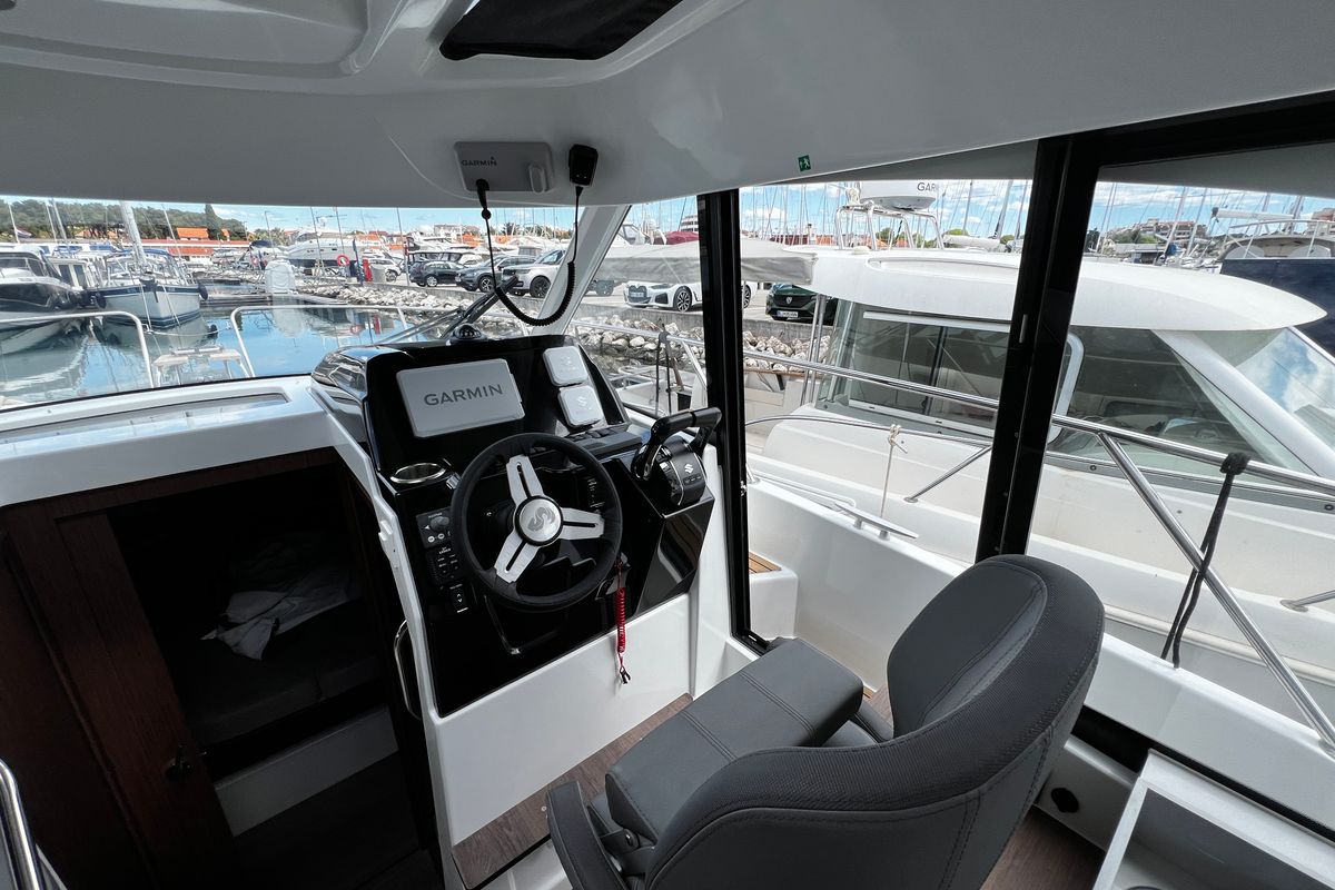 Cockpit of Ana, a Beneteau Antares 9 OB motorboat at Grad Biograd na Moru, Croatia