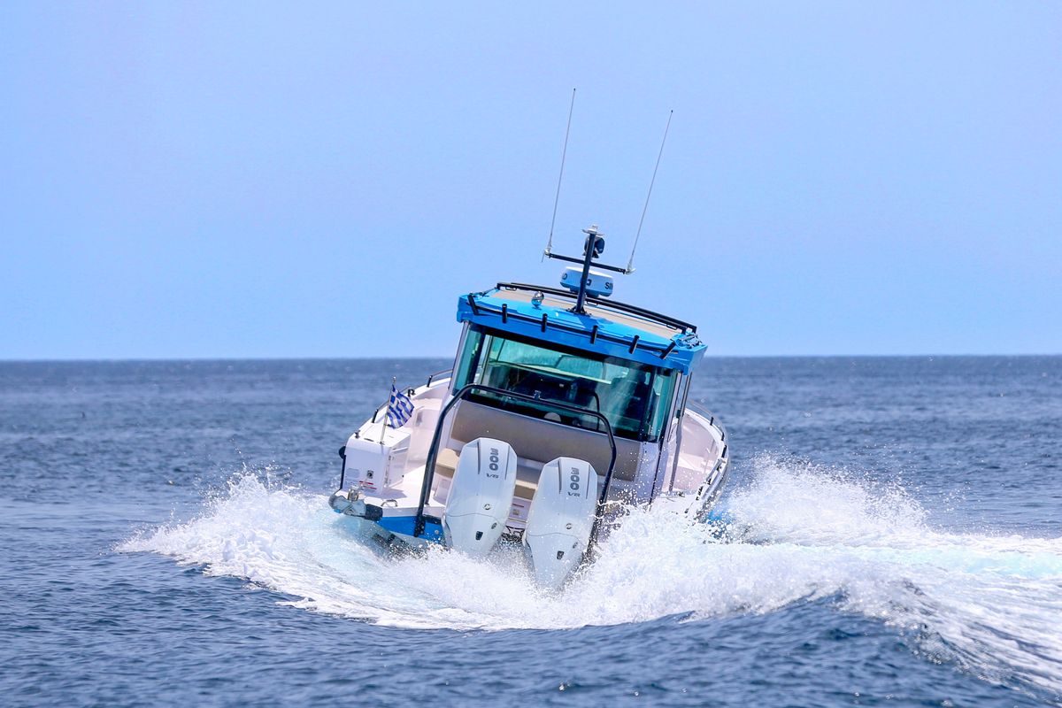 Exterior view of VIDA, a Axopar 37 XC Cross Cabin motorboat at Lavreotiki Municipal Unit, Greece