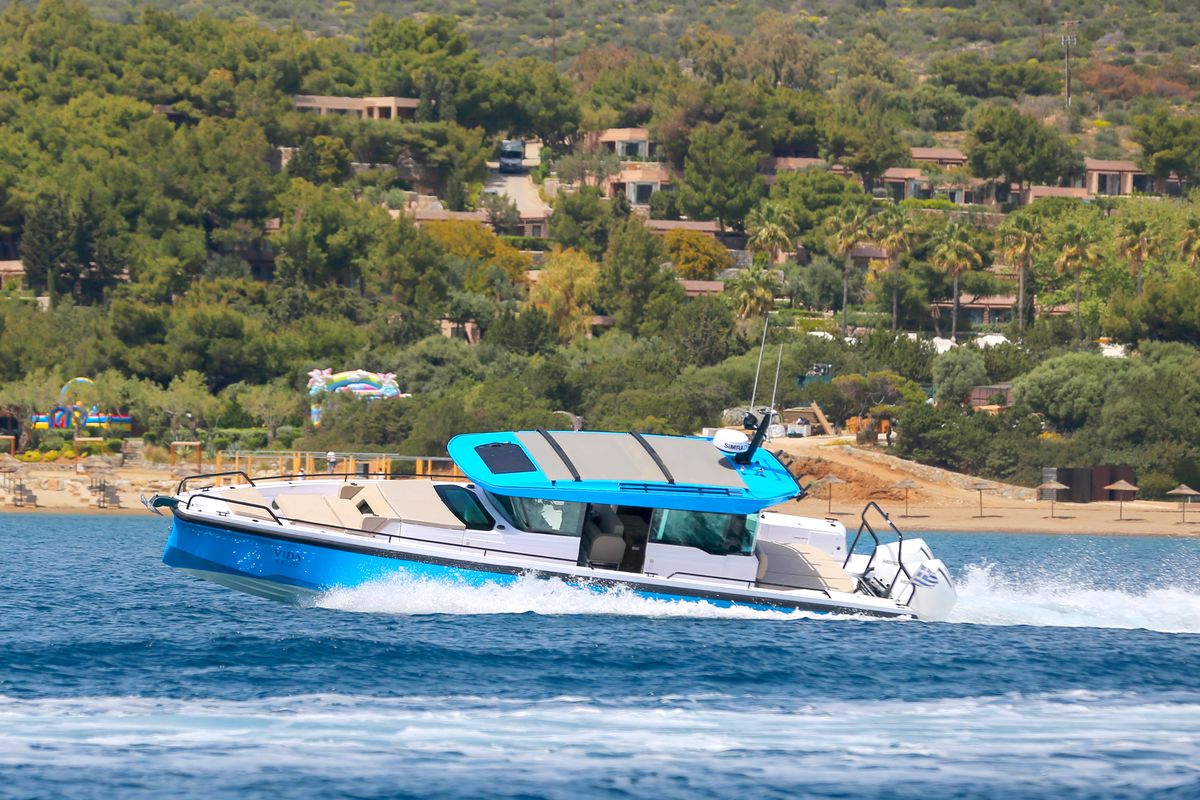 Exterior view of VIDA, a Axopar 37 XC Cross Cabin motorboat at Lavreotiki Municipal Unit, Greece