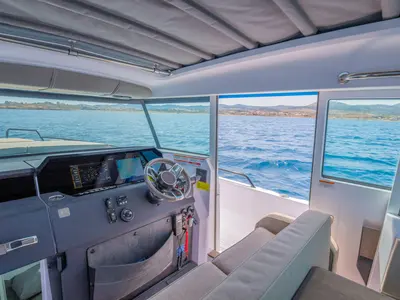 Cockpit of VIDA, a Axopar 37 XC Cross Cabin motorboat at Lavreotiki Municipal Unit, Greece