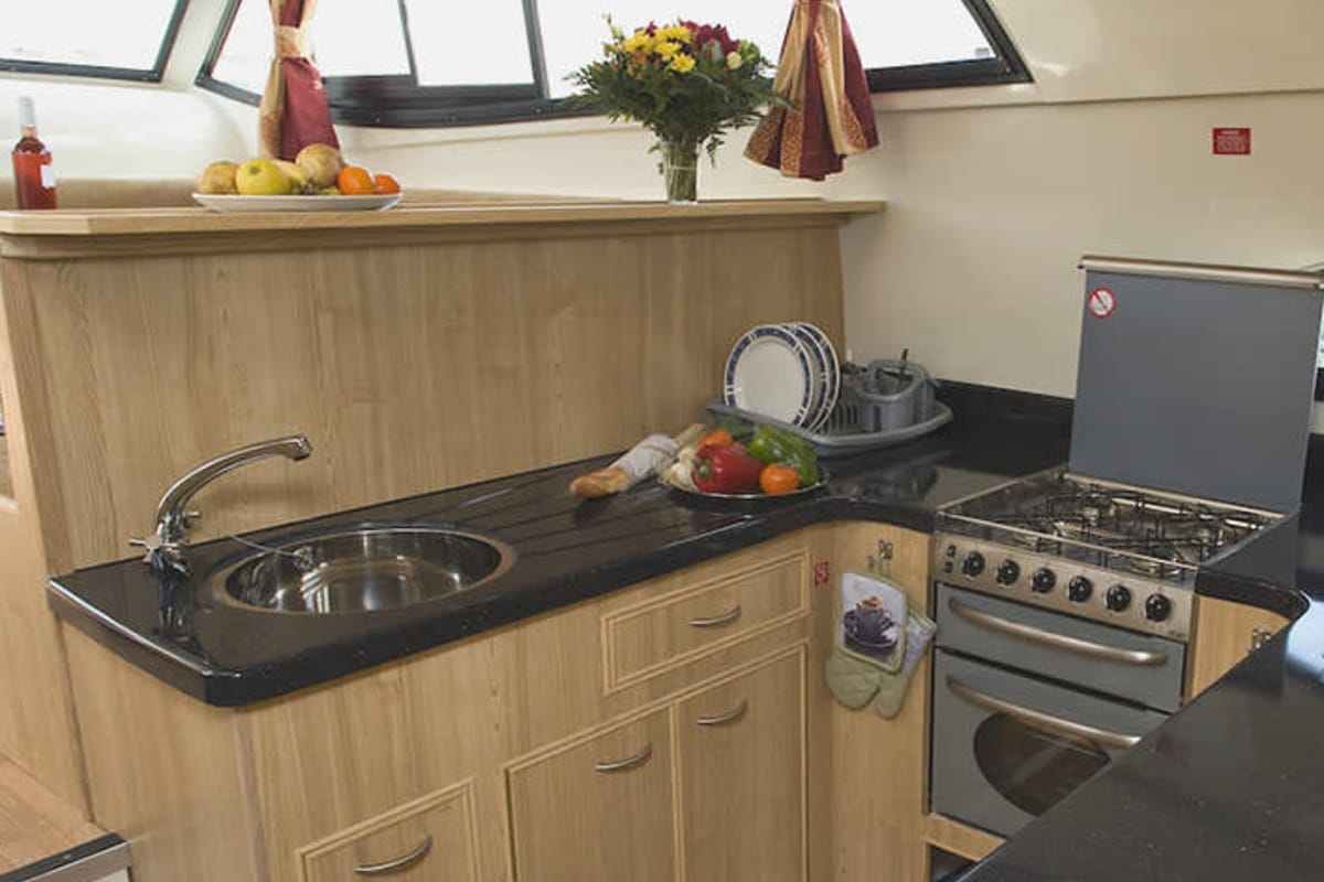 Galley of Mystique - Comfort Plus 2, a Cygnet Mystique motorboat at Portiragnes, France