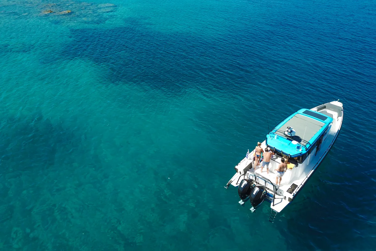 Deck of TRAVERSO, a Axopar 37 XC Cross Cabin motorboat at Gouvia, Greece
