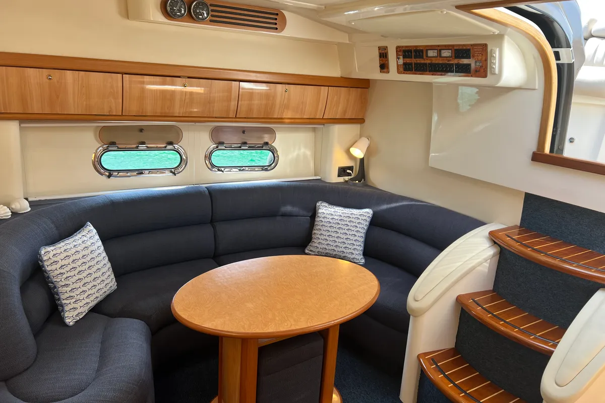 Salon of Orca, a Sealine S 42 motorboat at Imperia, Italy