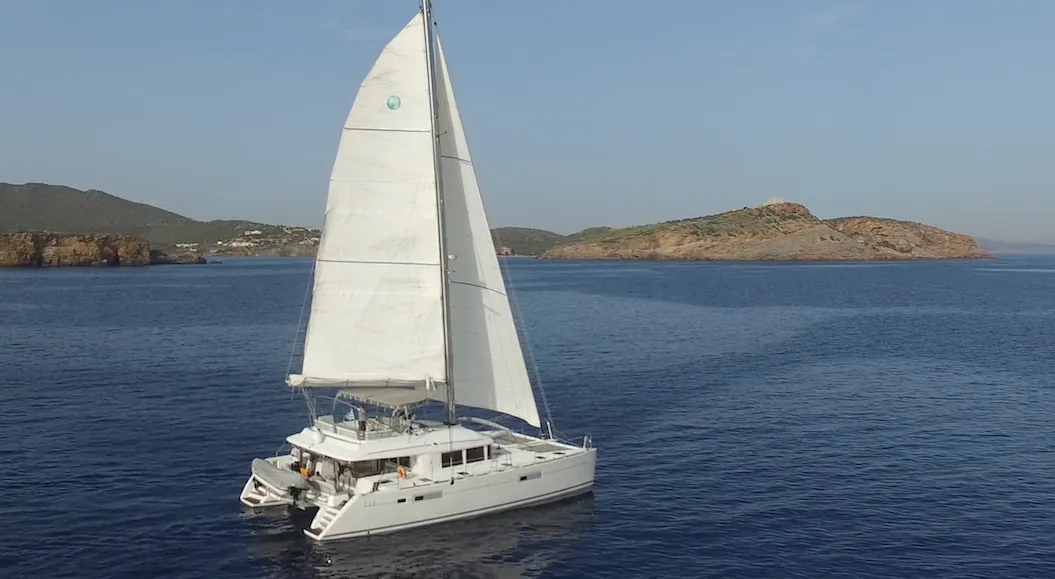 Exterior view of Daddy’s Hobby, a Lagoon 560 catamaran at Lavreotiki Municipal Unit, Greece