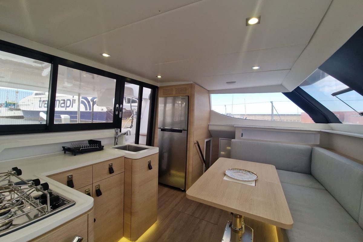 Galley of HAKUNA, a Aventura Catamarans Aventura 37 catamaran at Sant Antoni de Portmany, Spain