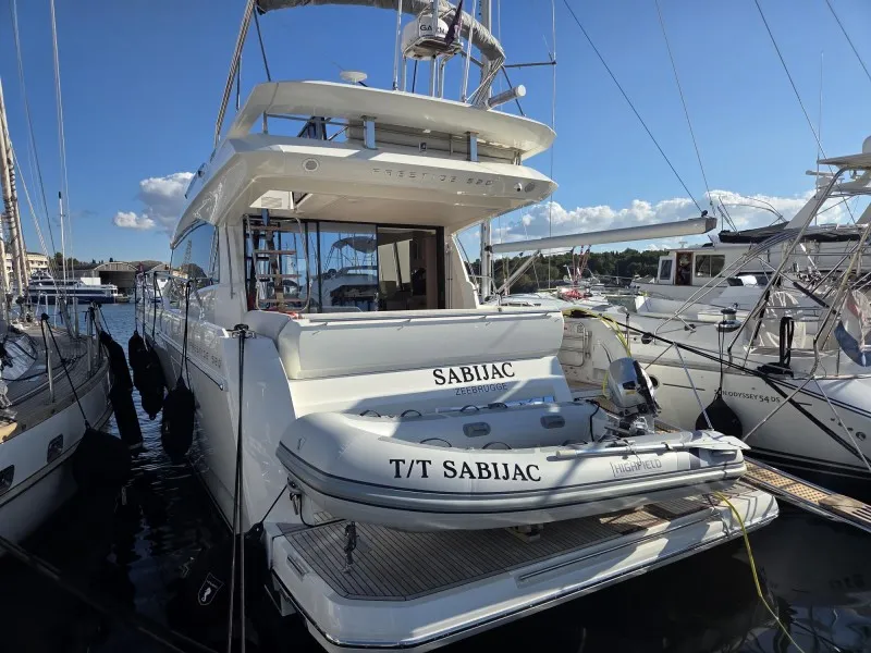 Exterior view of Sabijac, a Jeanneau Prestige 520 Flybridge yacht at Grad Šibenik, Croatia