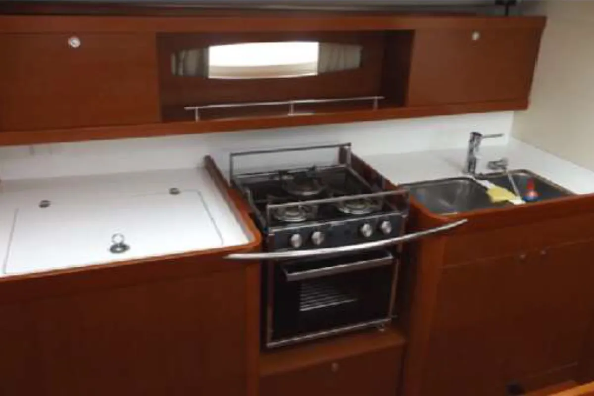 Galley of IN COMPLIANCE, a Beneteau Oceanis 50 sailboat at Kalkara, Malta