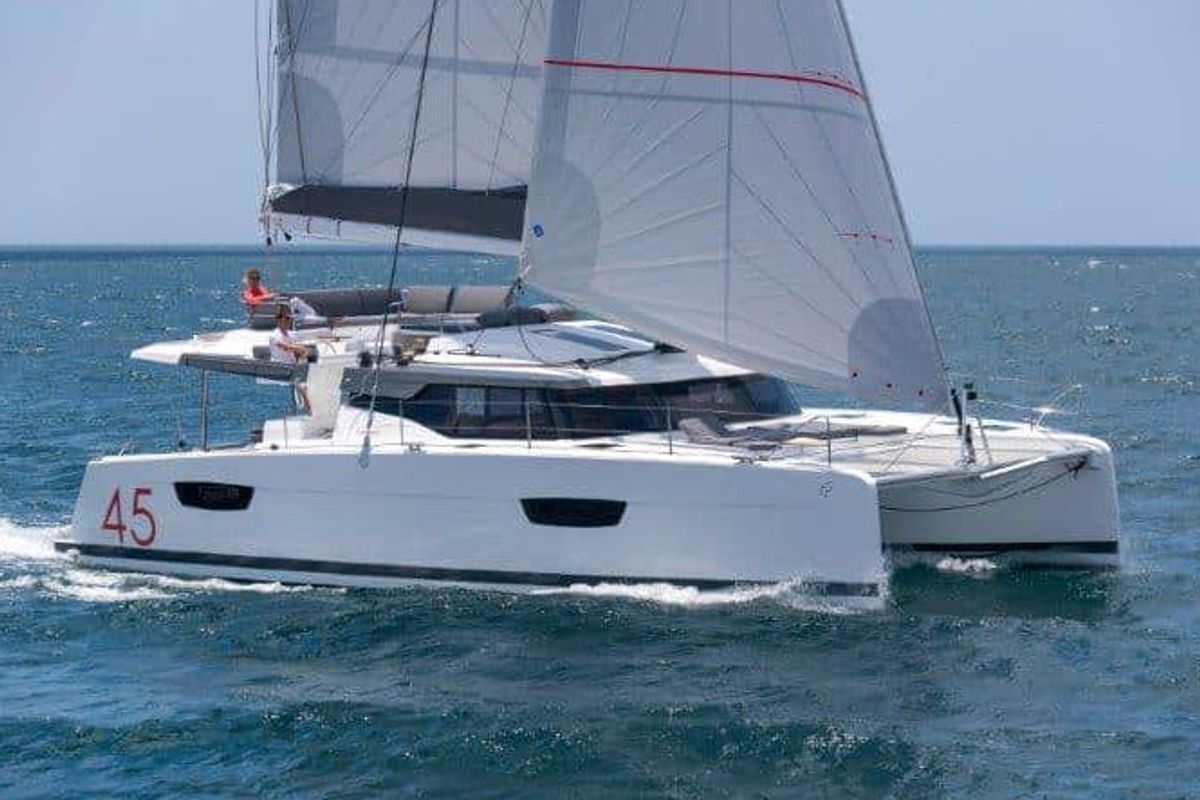 Exterior view of Christina, a Fountaine Pajot Elba 45 catamaran at es Jonquet, Spain