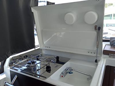 Galley of Surprise, a Jeanneau Merry Fisher 895 Sport Offshore motorboat at Punat, Croatia