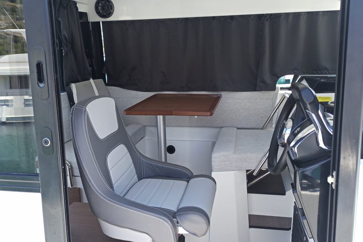 Salon of Surprise, a Jeanneau Merry Fisher 895 Sport Offshore motorboat at Punat, Croatia