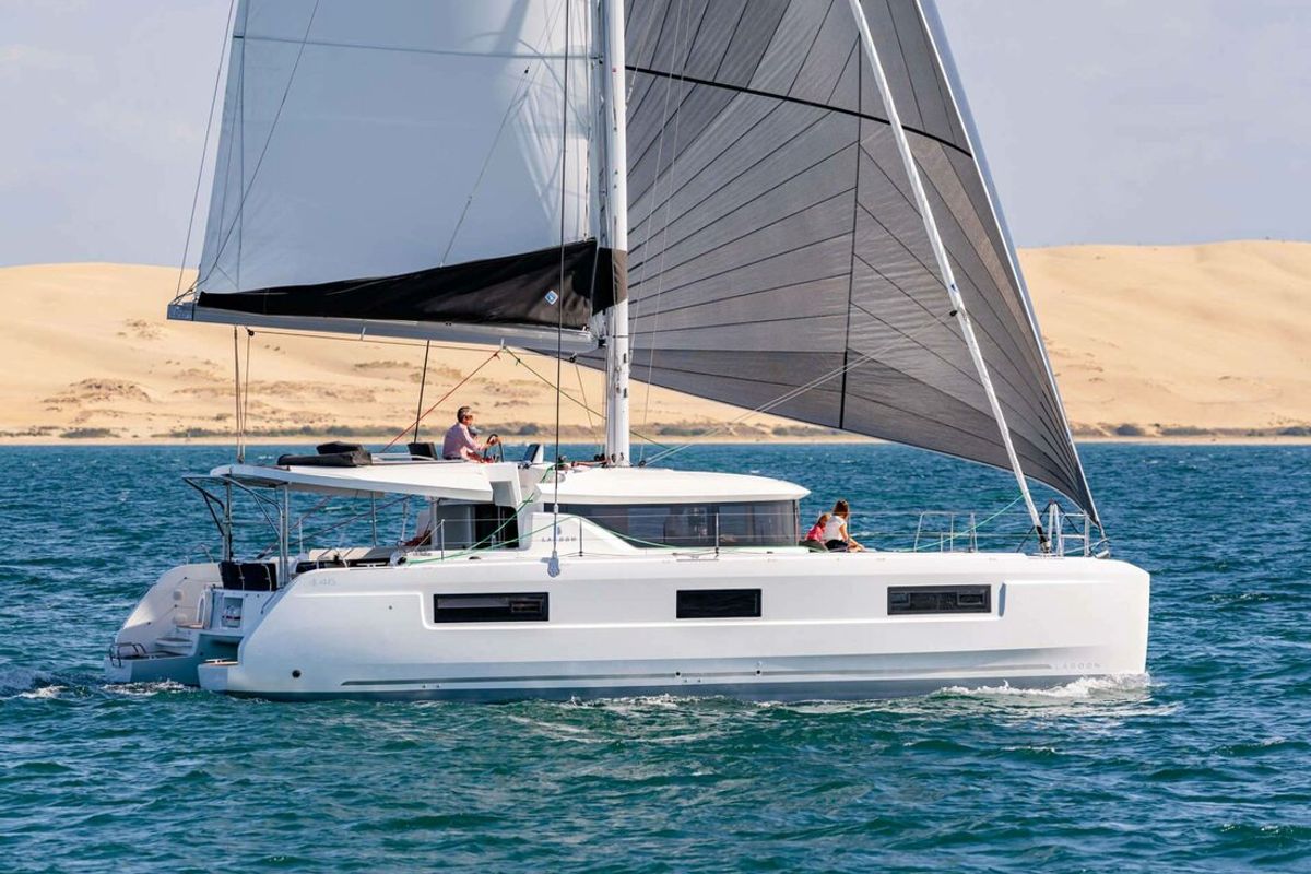Exterior view of Voyager, a Lagoon 46 catamaran at Palma de Mallorca, Spain