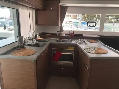 Paula, a Lagoon Lagoon 450 Fly catamaran at Sant Antoni de Portmany, Spain