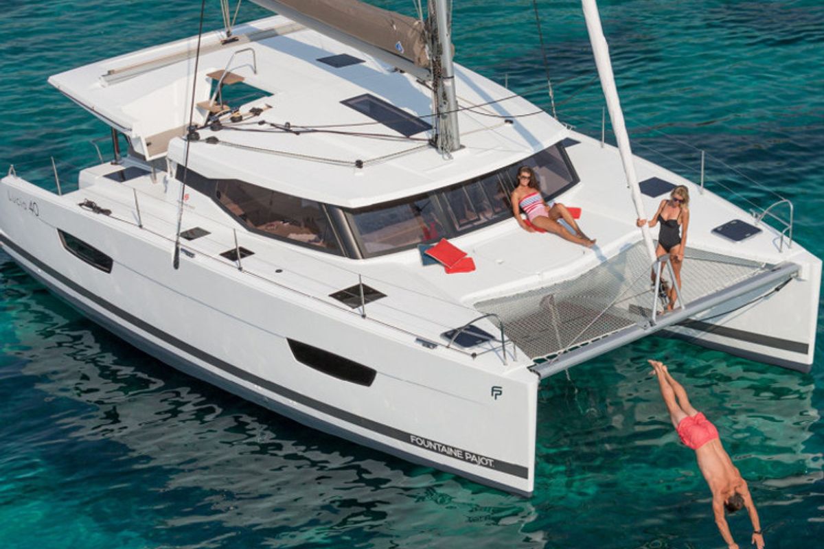 Exterior view of Summer Sun, a Fountaine Pajot Lucia 40 catamaran at Portimão, Portugal