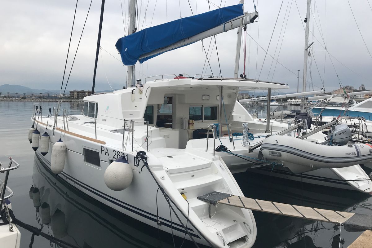 Exterior view of Isis, a Lagoon 440 catamaran at Olbia, Italy