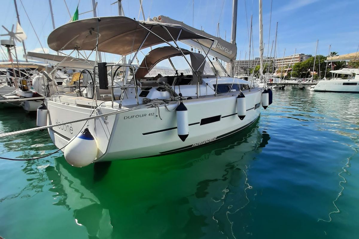 Exterior view of Hedoné, a Dufour 412 Grand large sailboat at Tonnarella, Italy