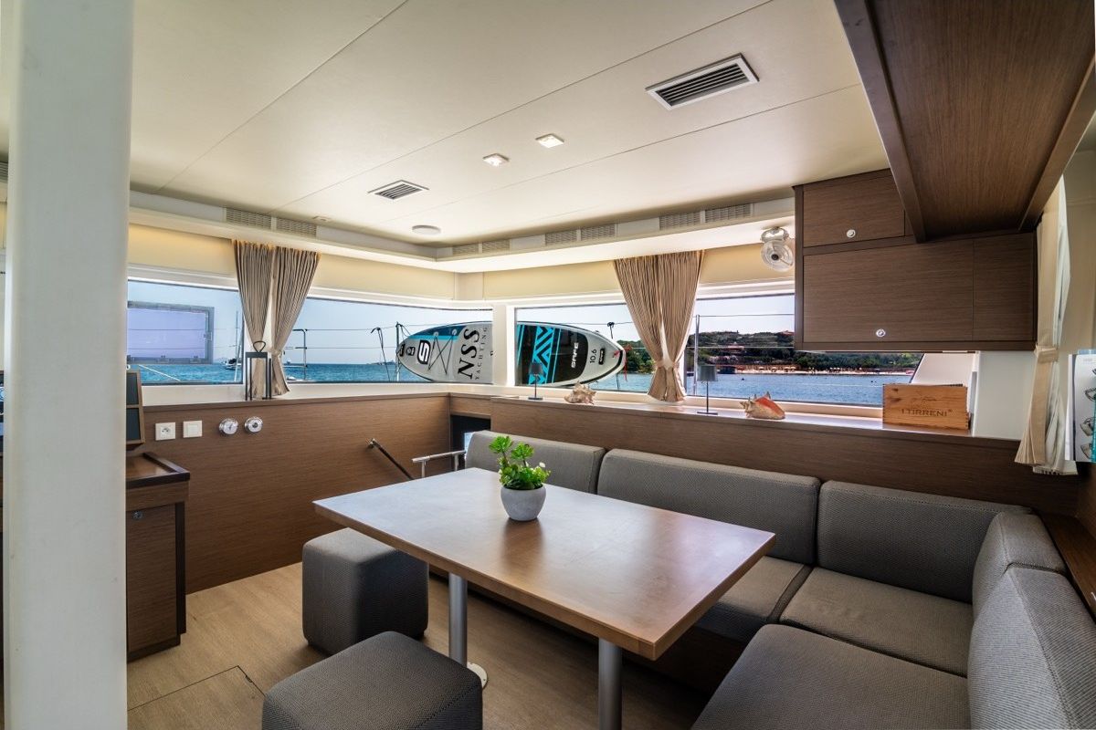 Salon of Big Mama, a Lagoon 52F catamaran at Olbia, Italy
