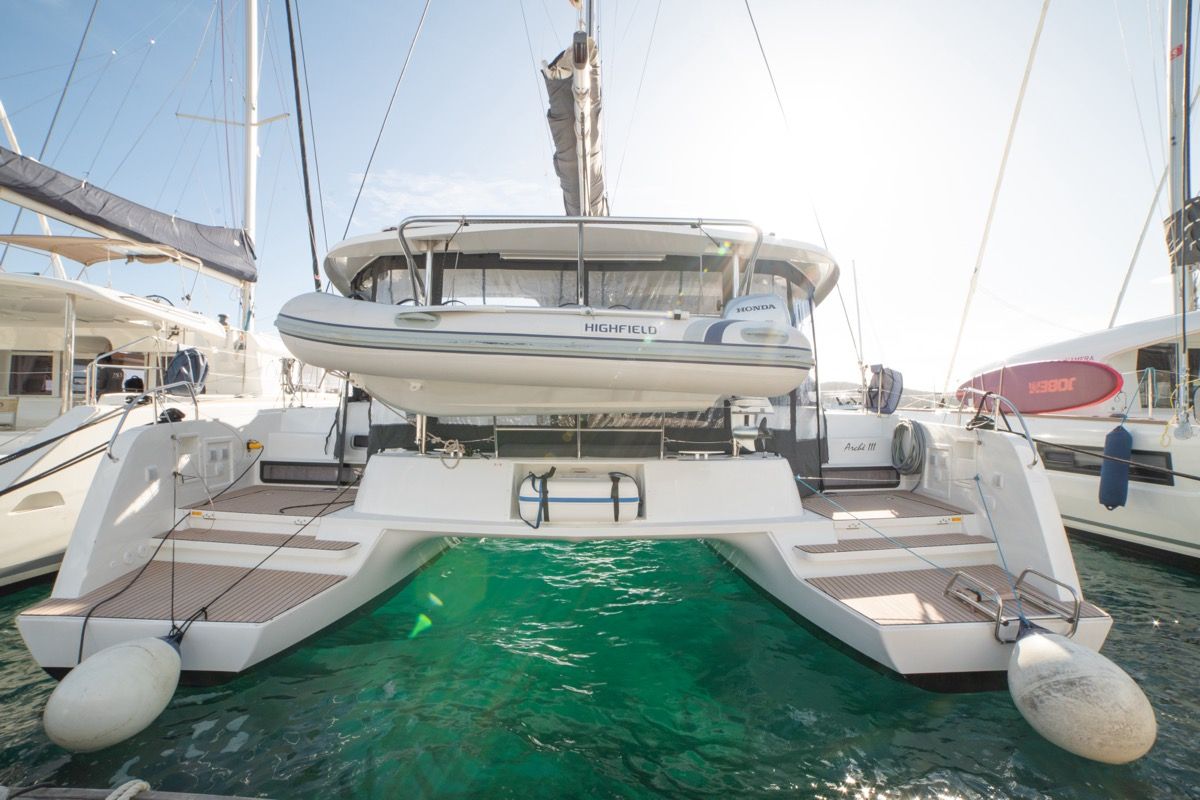 Exterior view of Archè III, a Lagoon 42 catamaran at Olbia, Italy