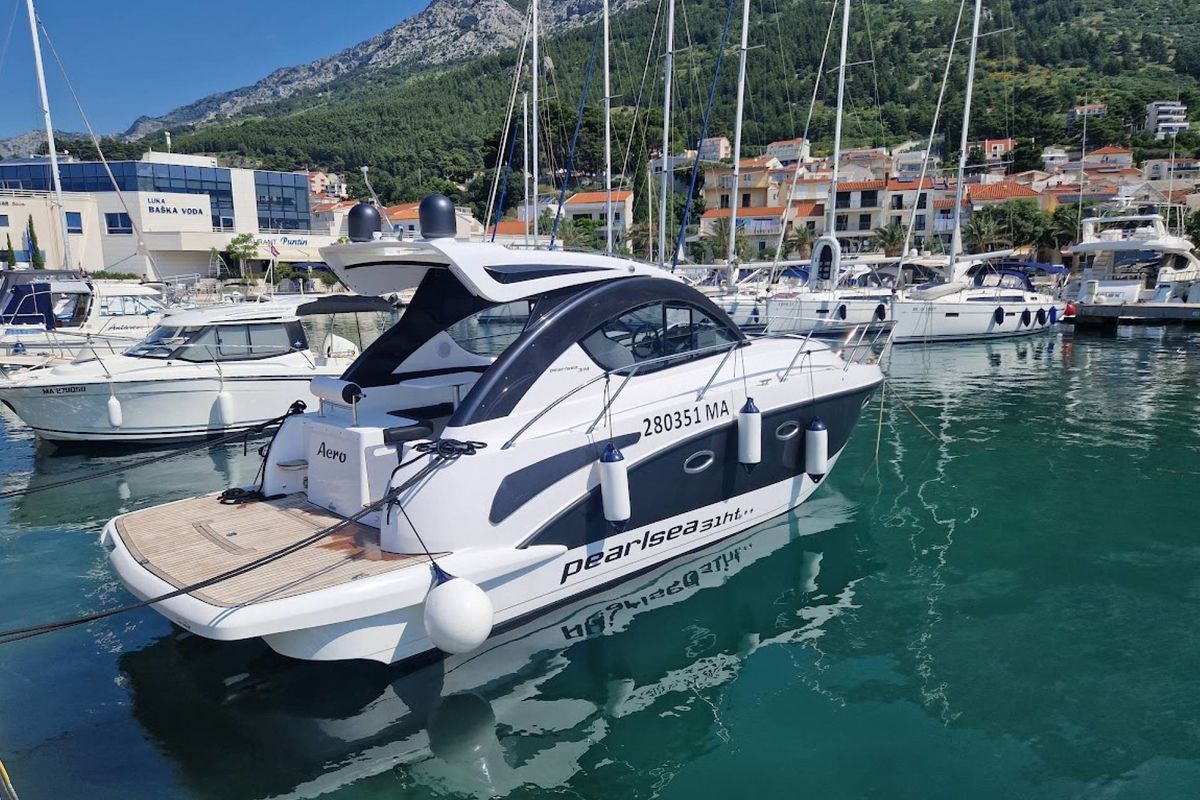 Exterior view of Aero, a Pearl Sea 31 Hard Top motorboat at Općina Baška Voda, Croatia