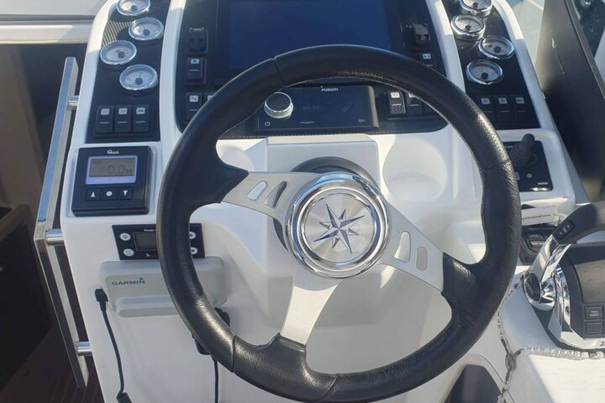 Cockpit of Aero, a Pearl Sea 31 Hard Top motorboat at Općina Baška Voda, Croatia