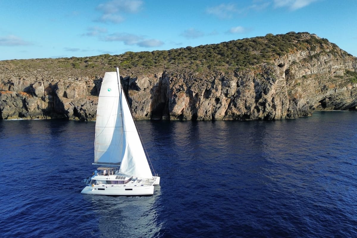 Exterior view of Baltsar, a Lagoon 560 S2 catamaran at Sant Antoni de Portmany, Spain