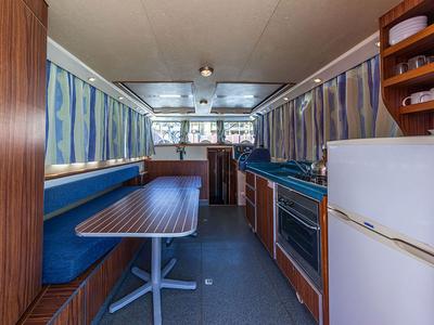 Salon of 1260R-24, a Pénichette 1260 motorboat at Argens-Minervois, France