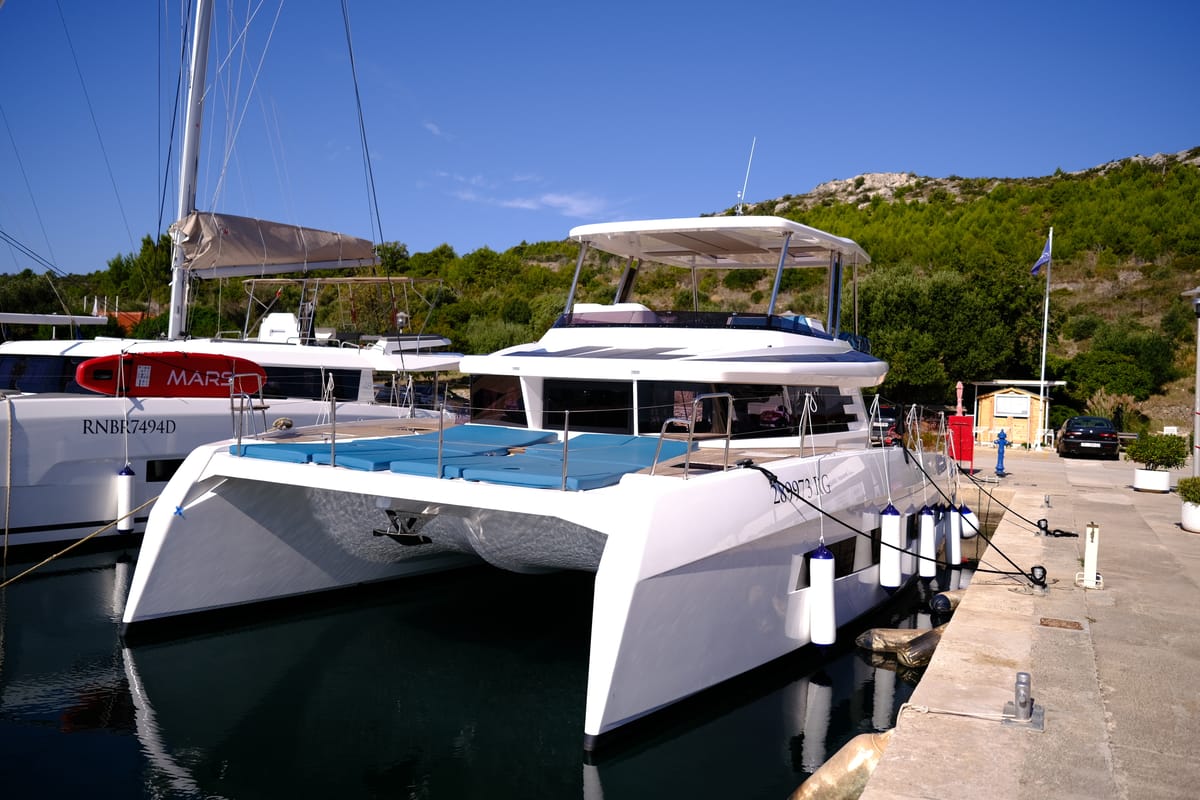 Exterior view of Abuzz, a Cervetti 44 Power catamaran at Primošten, Croatia