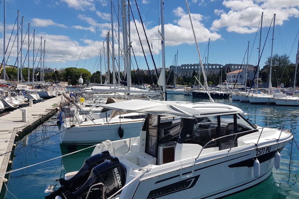 Exterior view of Riva, a Jeanneau Merry Fisher 895 motorboat at Grad Biograd na Moru, Croatia