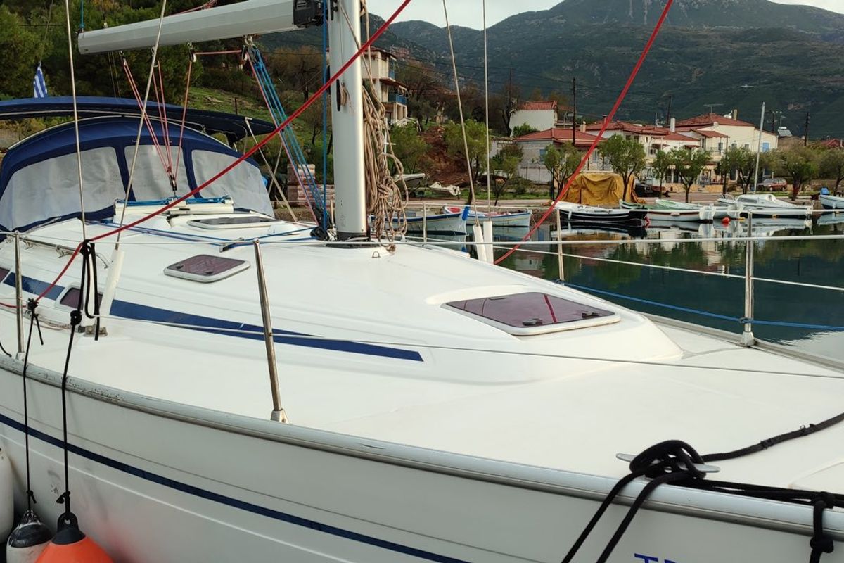 Exterior view of Tritonas, a Bavaria 38 Cruiser sailboat at Municipal Unit of Ellomenos, Greece