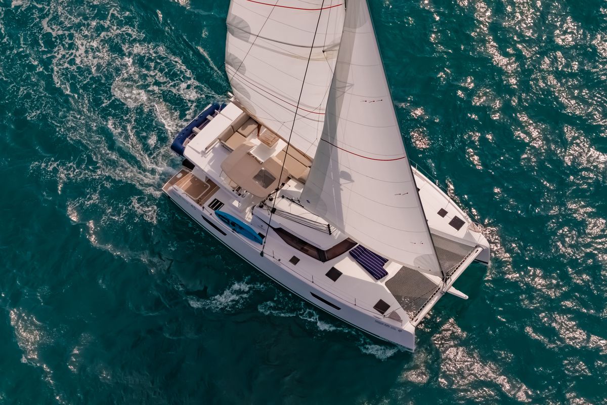 Exterior view of Chammak Challo, a Fountaine Pajot Elba 45 catamaran at Mai Khao, Thailand