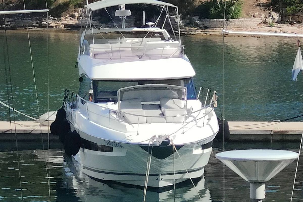 Exterior view of Adudu 2, a Jeanneau Prestige 460 Fly yacht at Dubrovnik, Croatia