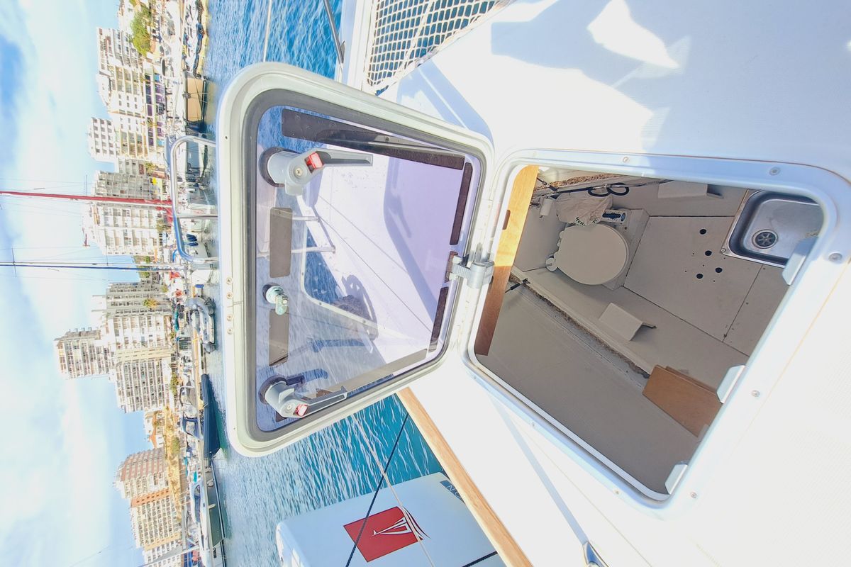 Head on Lluna, a Lagoon 450 catamaran at Sant Antoni de Portmany, Spain
