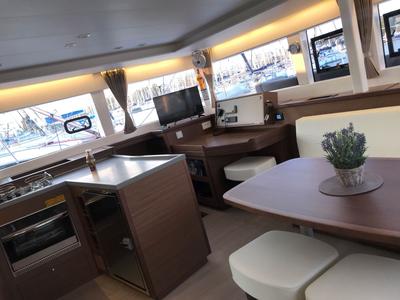 Salon of ISMA, a Lagoon 450 Fly catamaran at Sami Municipal Unit, Greece
