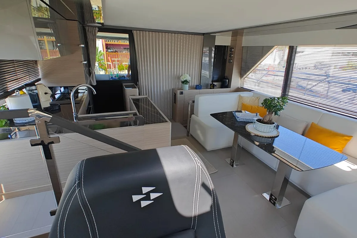 Salon of ViVa, a Prestige M48 catamaran at Castellammare di Stabia, Italy