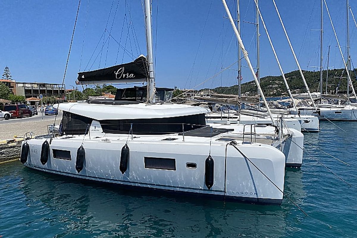 Exterior view of Orsa, a Lagoon 42 catamaran at Skiathos, Greece