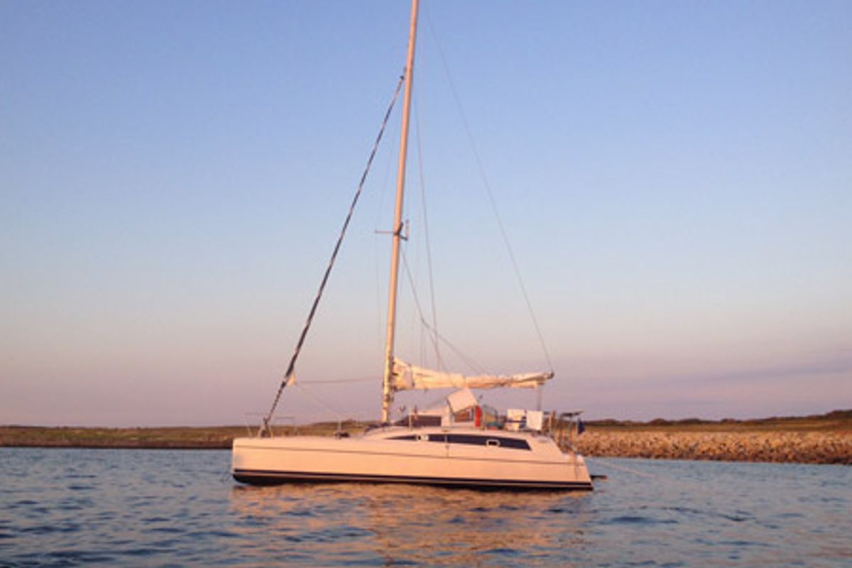 Exterior view of Smiley, a Fountaine Pajot Maldives 32 catamaran at Port Navalo, France