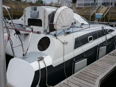 Exterior view of Smiley, a Fountaine Pajot Maldives 32 catamaran at Port Navalo, France