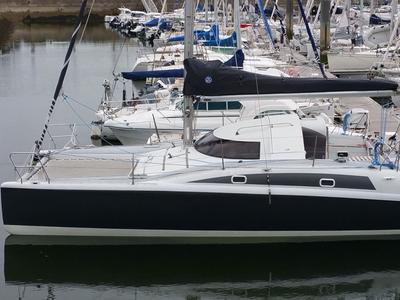 Exterior view of Smiley, a Fountaine Pajot Maldives 32 catamaran at Port Navalo, France