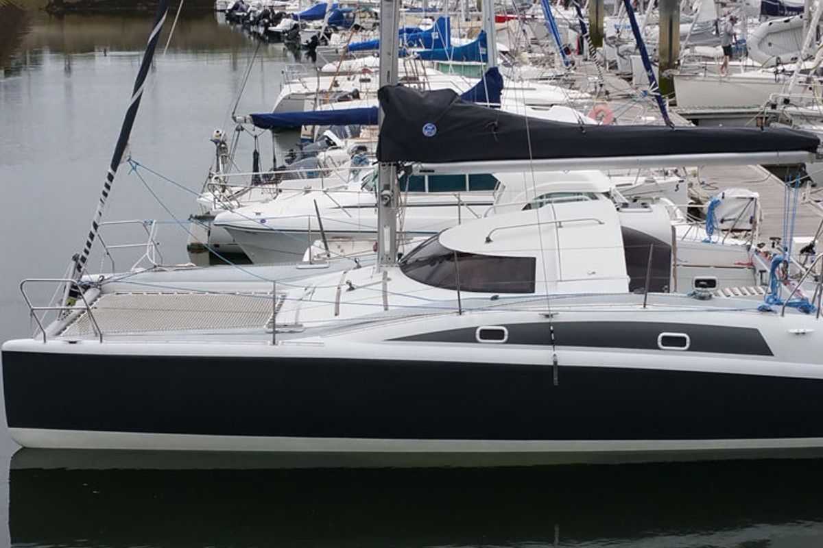 Exterior view of Smiley, a Fountaine Pajot Maldives 32 catamaran at Port Navalo, France