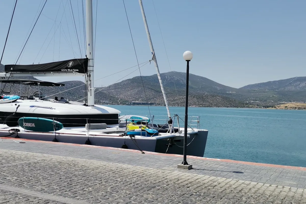 Exterior view of Atlantis, a Lagoon 620 catamaran at Lavreotiki Municipal Unit, Greece