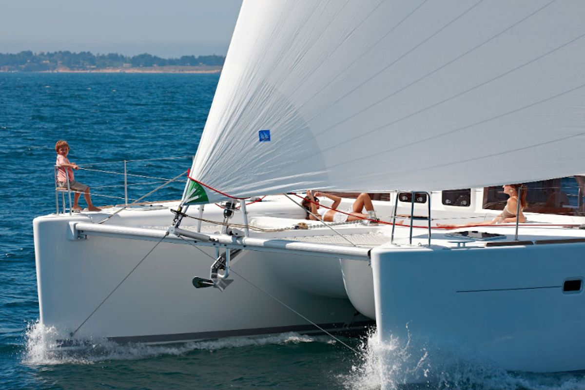 Exterior view of Caliente, a Lagoon 450 Fly catamaran at Thira Municipal Unit, Greece