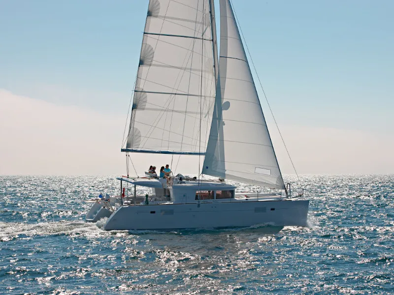 Exterior view of Caliente, a Lagoon 450 Fly catamaran at Thira Municipal Unit, Greece