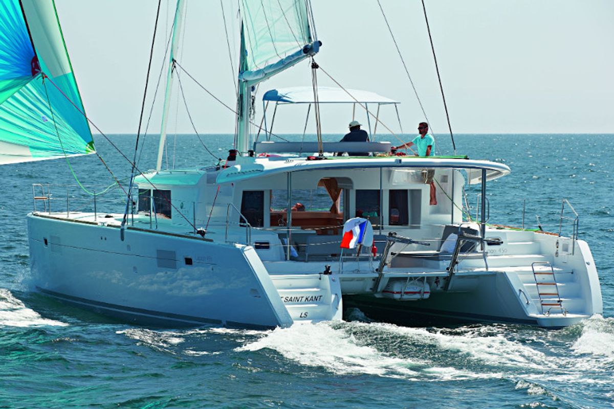 Exterior view of Caliente, a Lagoon 450 Fly catamaran at Thira Municipal Unit, Greece