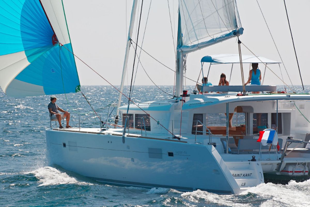 Exterior view of Caliente, a Lagoon 450 Fly catamaran at Thira Municipal Unit, Greece