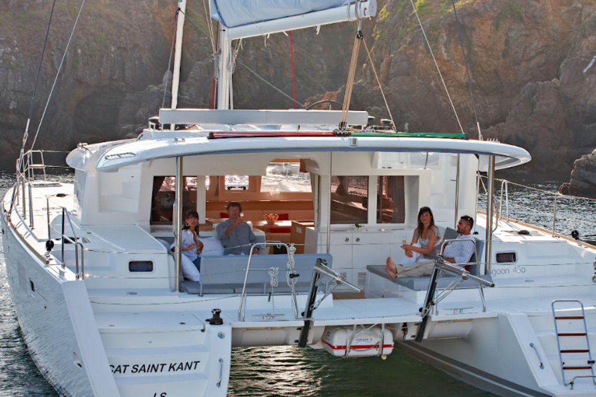 Exterior view of Caliente, a Lagoon 450 Fly catamaran at Thira Municipal Unit, Greece