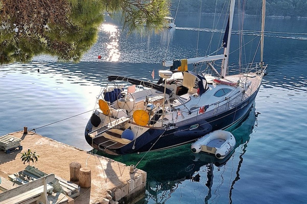 Exterior view of Olivia Adriatica, a Jeanneau Sun Odyssey 54 DS sailboat at Grad Šibenik, Croatia