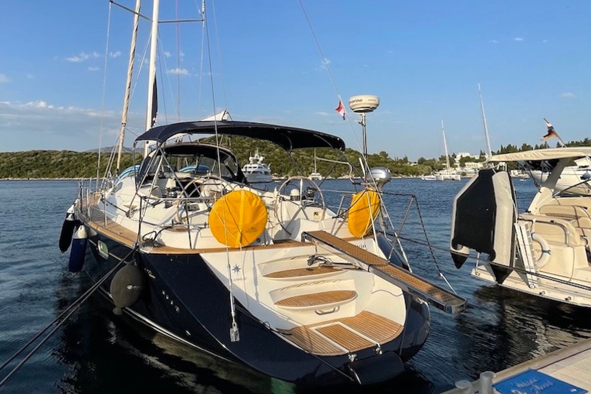 Exterior view of Olivia Adriatica, a Jeanneau Sun Odyssey 54 DS sailboat at Grad Šibenik, Croatia