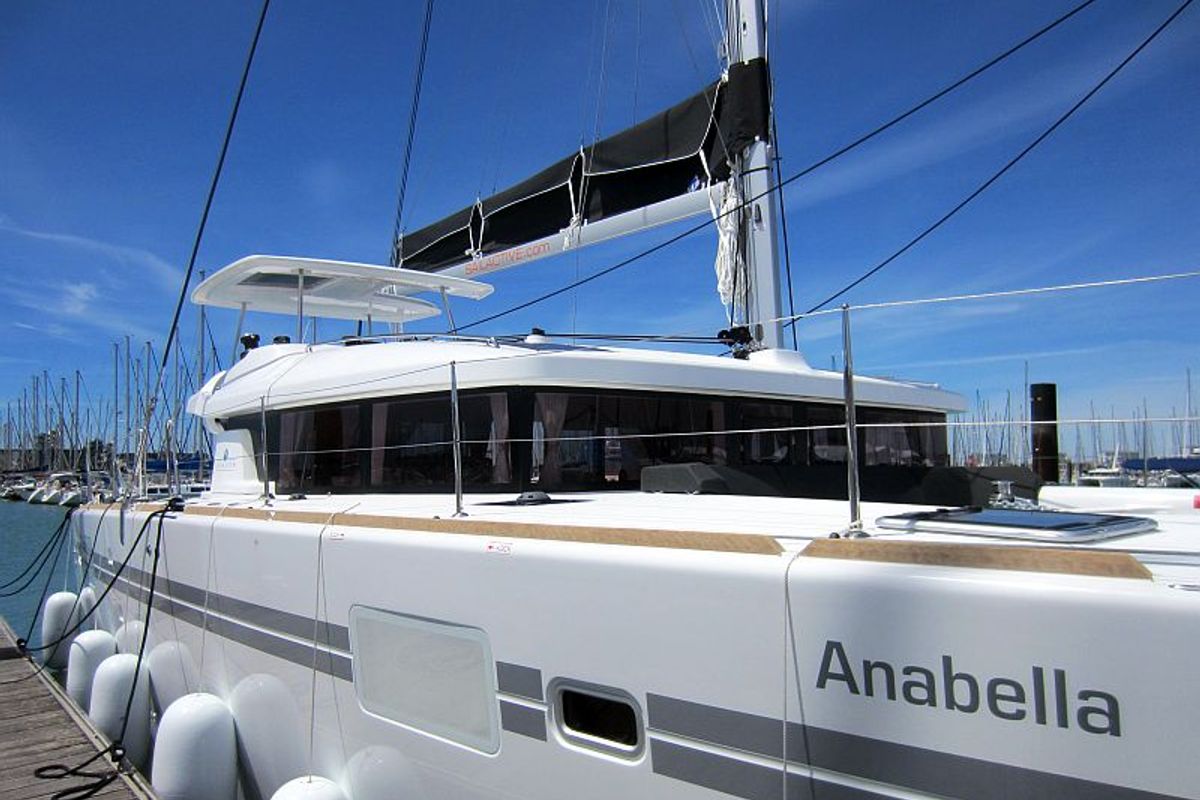 Exterior view of Anabella, a Lagoon 450 catamaran at Palma de Mallorca, Spain
