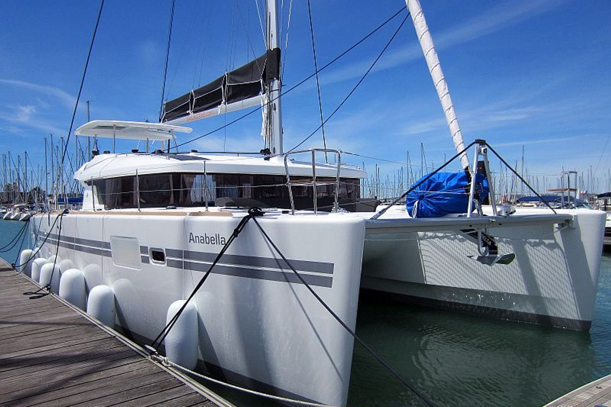 Exterior view of Anabella, a Lagoon 450 catamaran at Palma de Mallorca, Spain